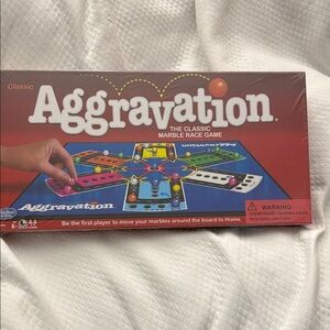 Hasbro Aggravation Game with Colorful Board. Brand New Factory Sealed box
